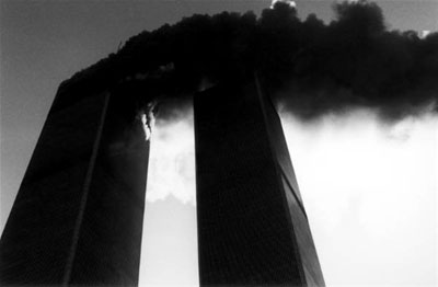 Smoke pours from the World Trade Center Towers