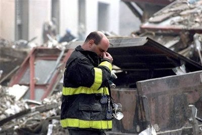 A hero firefighter catches his breath