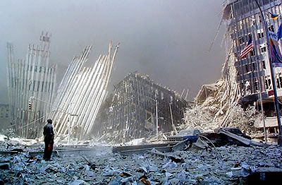 A rescue worker surveys the destruction at ground zero